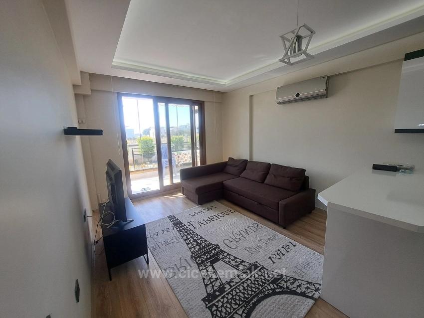 1+1-Apartment Zum Verkauf In Einer Anlage Mit Swimmingpool In Doğanbey, Seferihisar, İzmir