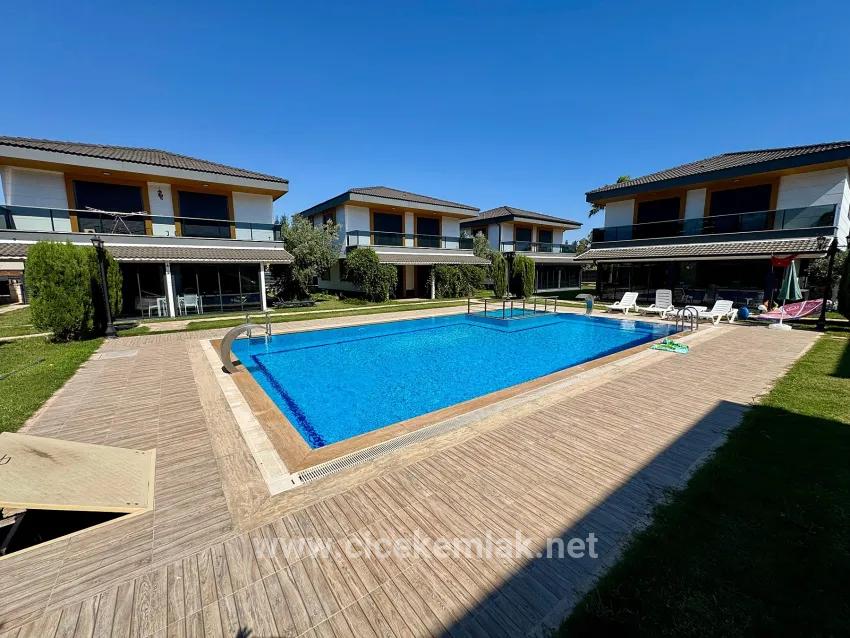 İzmir Seferihisar Doğanbey'de Satılık Translates To Izmir Seferihisar Doğanbey With For Sale, And Havuzlu Site İçerisinde Translates To Pool Villa Within The Site, And 3+1 Villa Translates To 3+1 Villa, Therefore: Izmir Seferihisar Doğanbey With For Sale Pool Villa Within The Site 3+1 Villa