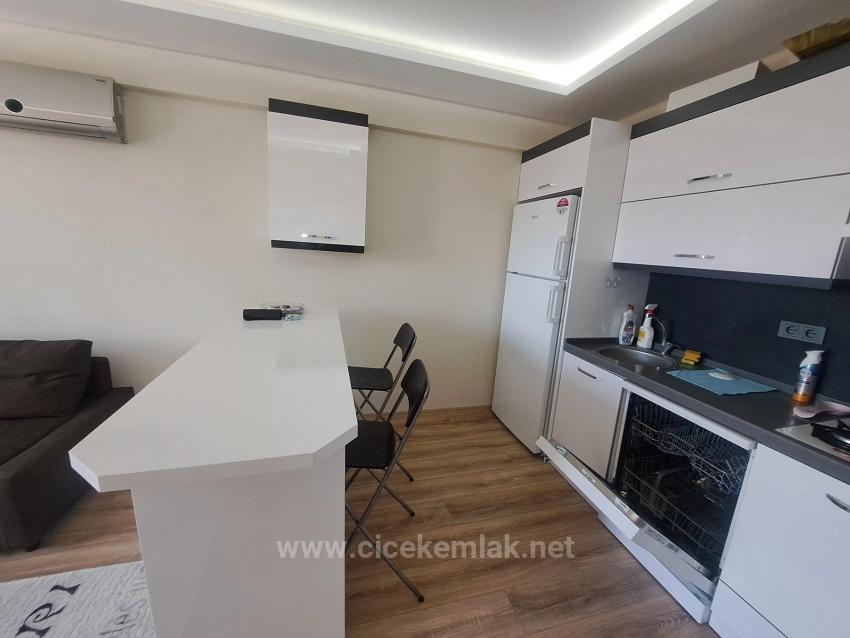1+1 Apartment For Sale In A Complex With A Swimming Pool In Doğanbey, Seferihisar, İzmir