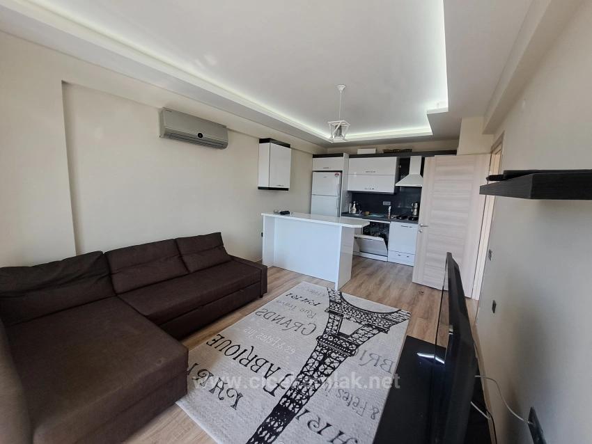 1+1 Apartment For Sale In A Complex With A Swimming Pool In Doğanbey, Seferihisar, İzmir