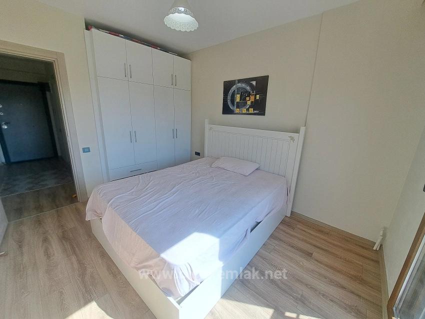 1+1 Apartment For Sale In A Complex With A Swimming Pool In Doğanbey, Seferihisar, İzmir